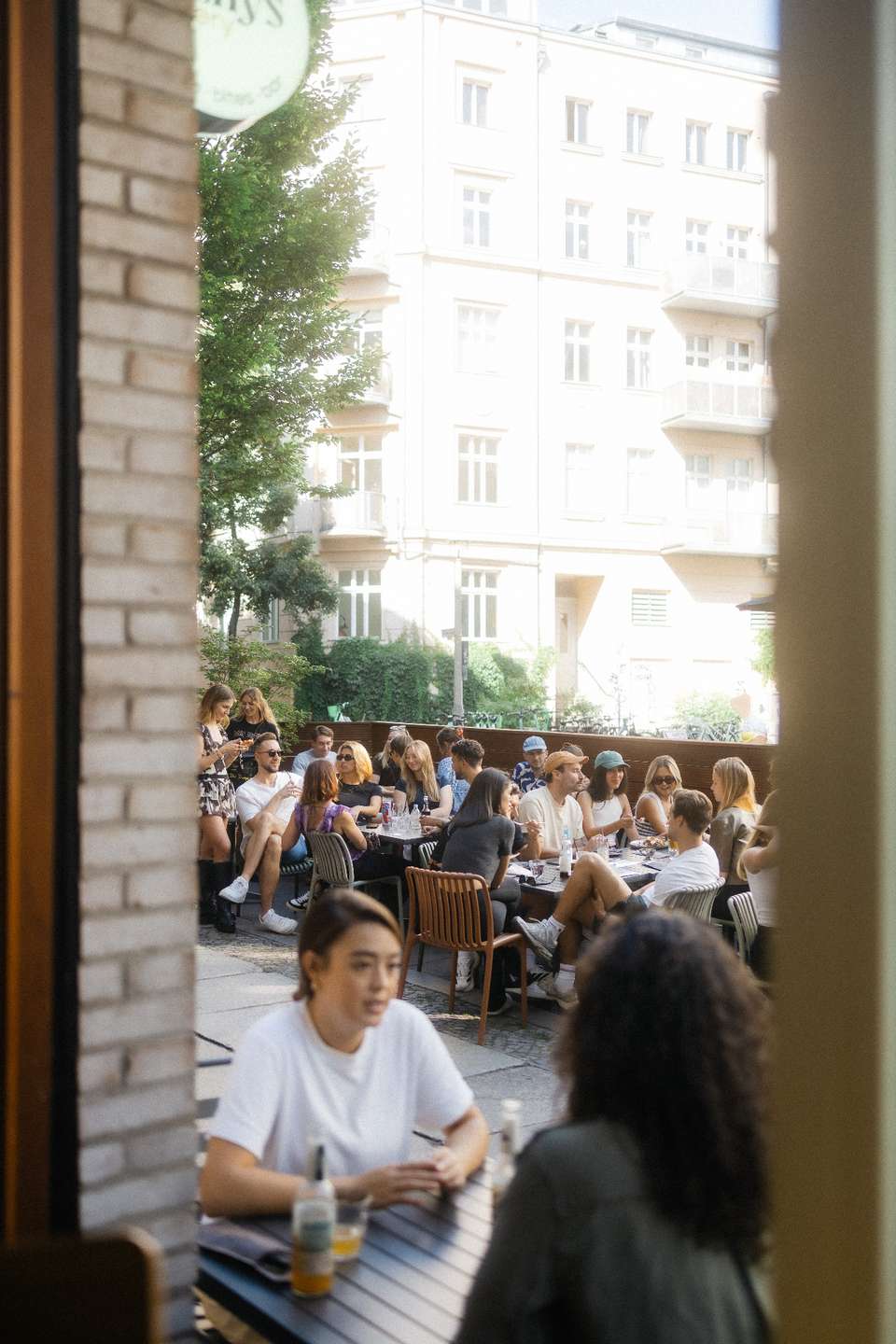 Guests enjoying the sunny terrace at Erchy's